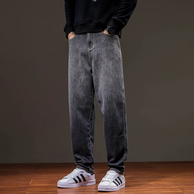 黑灰色牛仔裤男款宽松2024秋冬新款潮牌休闲长裤弹力哈伦裤子男款