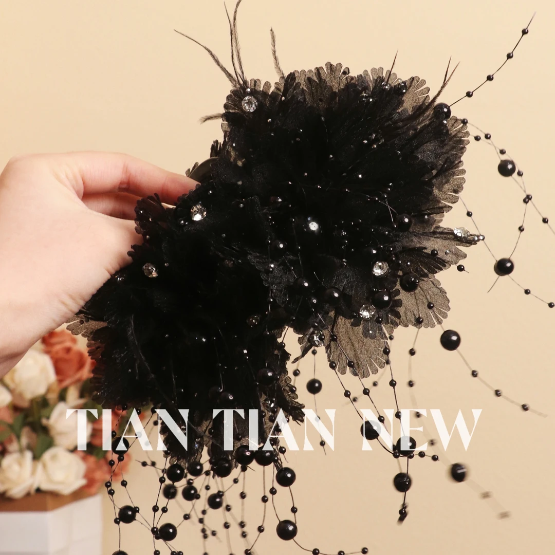 A194秋冬气质轻奢个性重工亮丝花朵羽毛流苏抓夹鲨鱼夹发饰