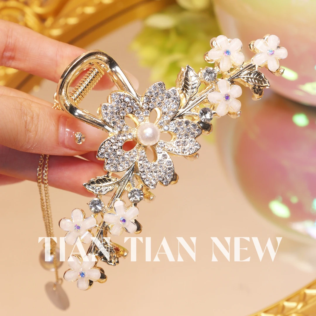 A308气质高级感繁花镂空蝴蝶流苏鲨鱼夹新款后脑勺抓夹精致盘发女