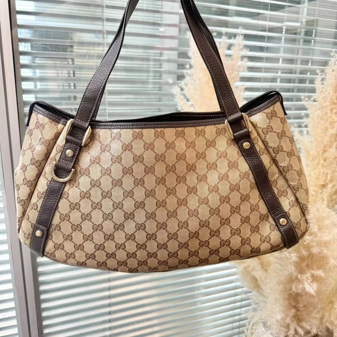 95新 GUCCI/古驰  XM/棕色老花拼皮   腋下单肩包/MH06830088