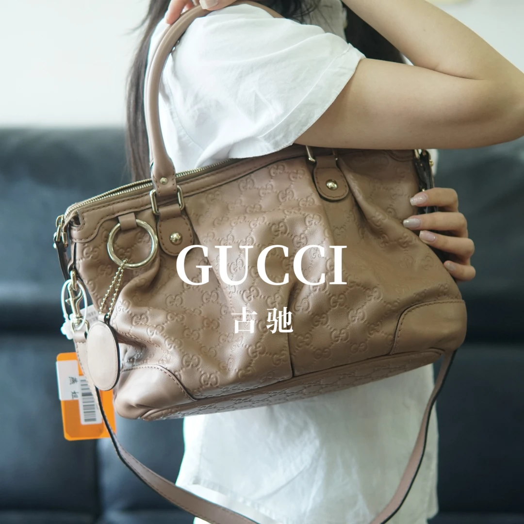 95新 GUCCI/古驰 奶茶色全皮压纹饺子包/DD08710049/09
