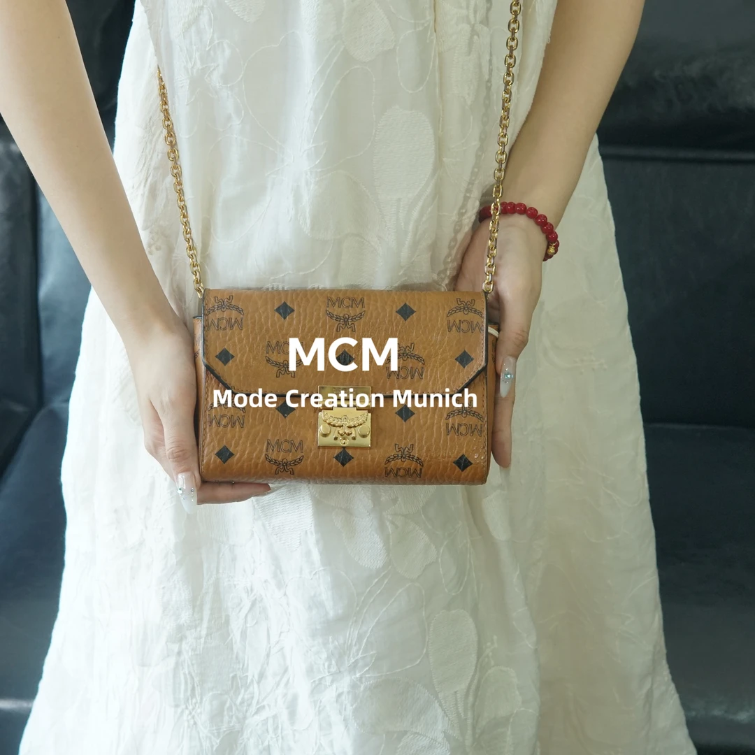 95新 MCM 经典干邑色翻盖链条斜挎包/EE07527040/09