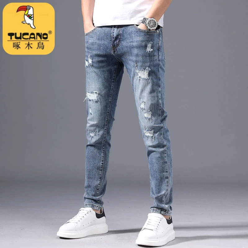 啄木鸟高端破洞牛仔裤男修身小脚秋季痞帅浅色休闲弹力韩版裤子男