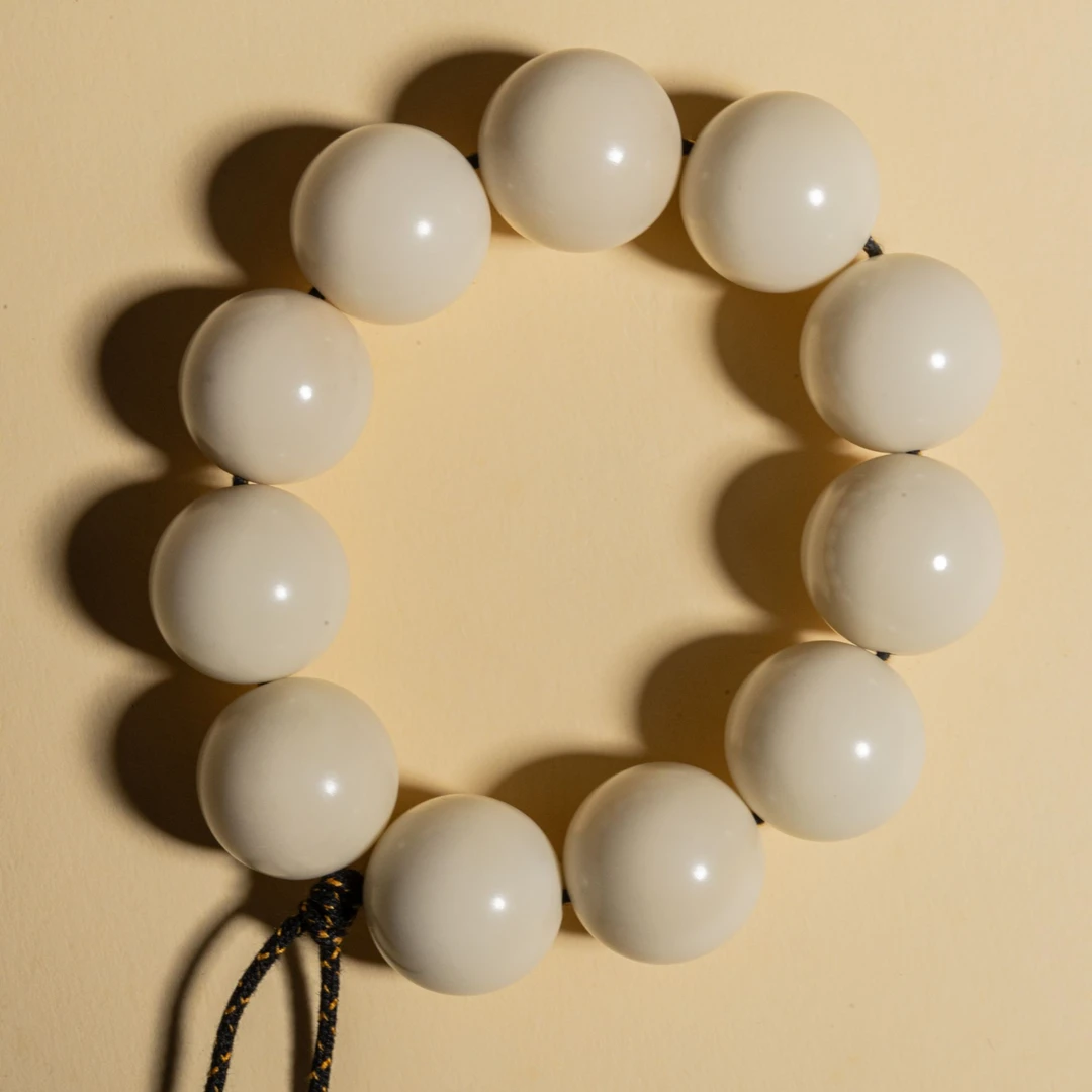 22mm+牙果大手持《宝珠》圆珠10+1颗自带天然纹路 会开片后期牙黄色