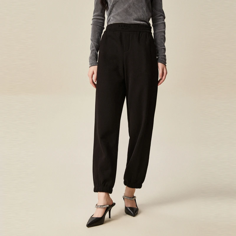 XG雪歌黑色收腰设计通勤休闲裤冬季新款淑女风纯棉哈伦长裤女