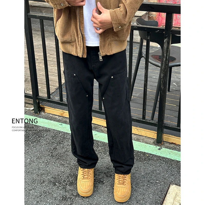 Entong美式复古工装伐木裤男生潮牌双膝铆钉设计直筒百搭牛仔裤子