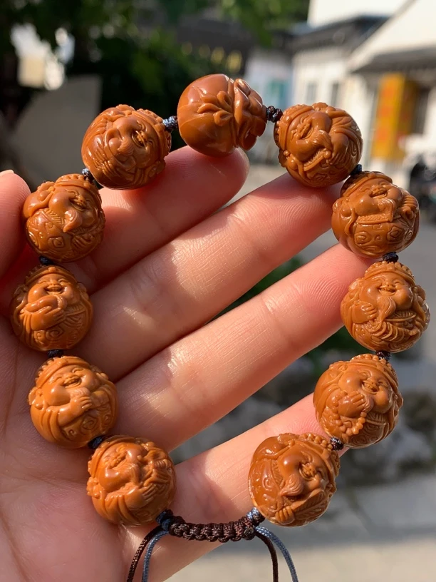 自然光实拍【十小财神】手工橄榄核1.55左右共11颗籽圆润饱满