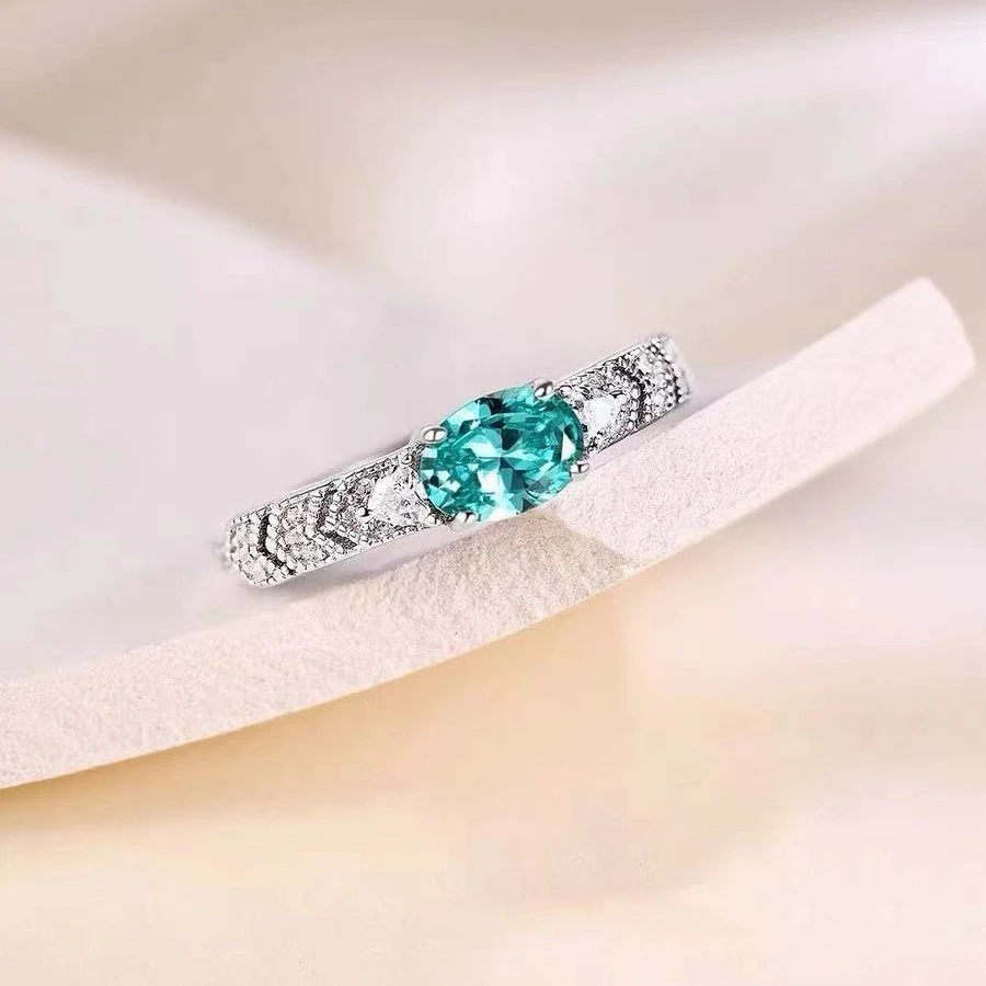 铜合金合成锆石戒指 镀k金法式轻奢经典气质精致镶嵌绿钻指环活口