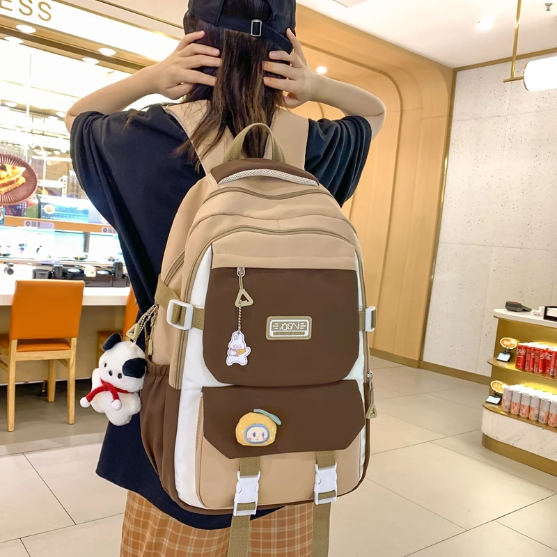 减负大容量书包女初中生高中小学生背包三到六年级韩版百搭双肩包