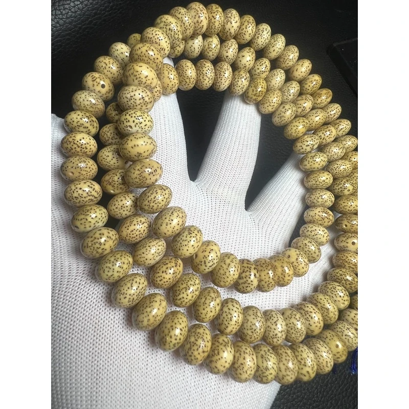 034612×8玄月苹果园原生态鸡油星月菩提黄高抛光108+颗左右手串