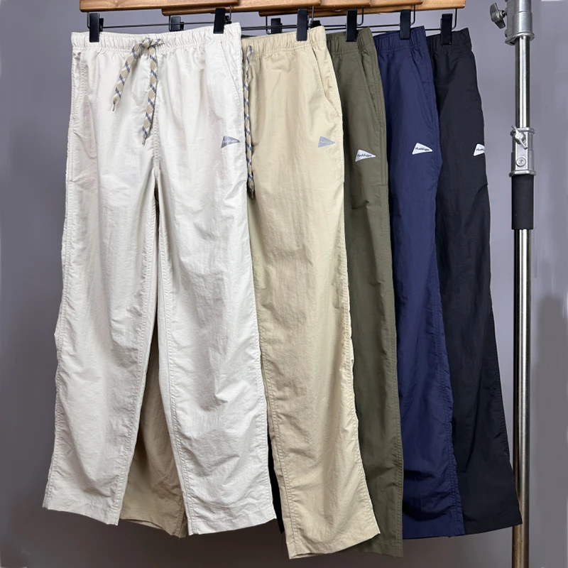 新款流行夏季小方格面料三防微锥直筒宽松休闲时尚运动长裤休闲裤