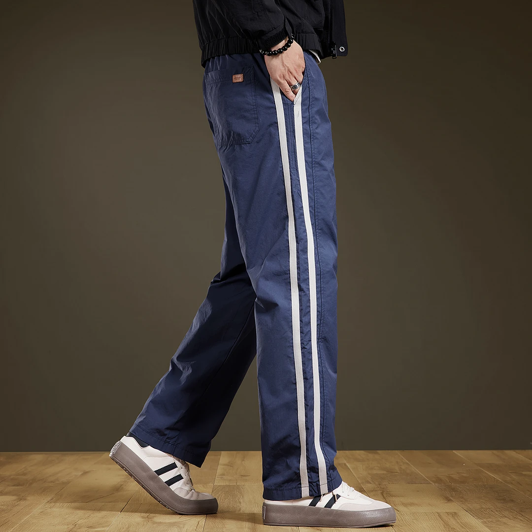 高街潮牌侧边条纹休闲裤男秋季新款设计感宽松直筒长裤蓝色男裤子
