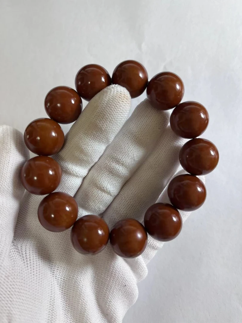 橄榄核正圆光珠1.5超精品小孔树王铁核，密度高核壁厚无补无漏同轴