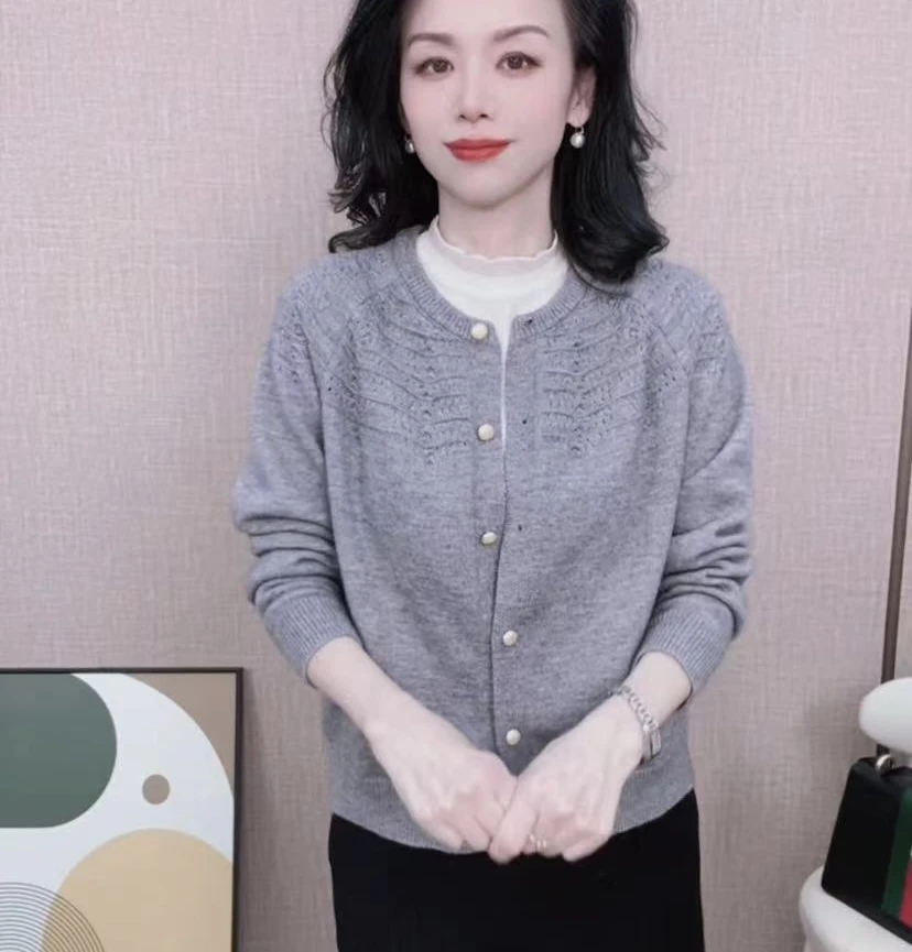 秋装女士新款 纯色气质时尚圆领宽松显瘦百搭镂空长袖针织开衫女