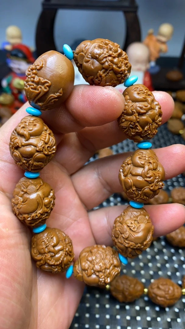 新加坡财迷雕刻手串.备注:不是（紫金鼠.橄榄核.小核桃）雕刻