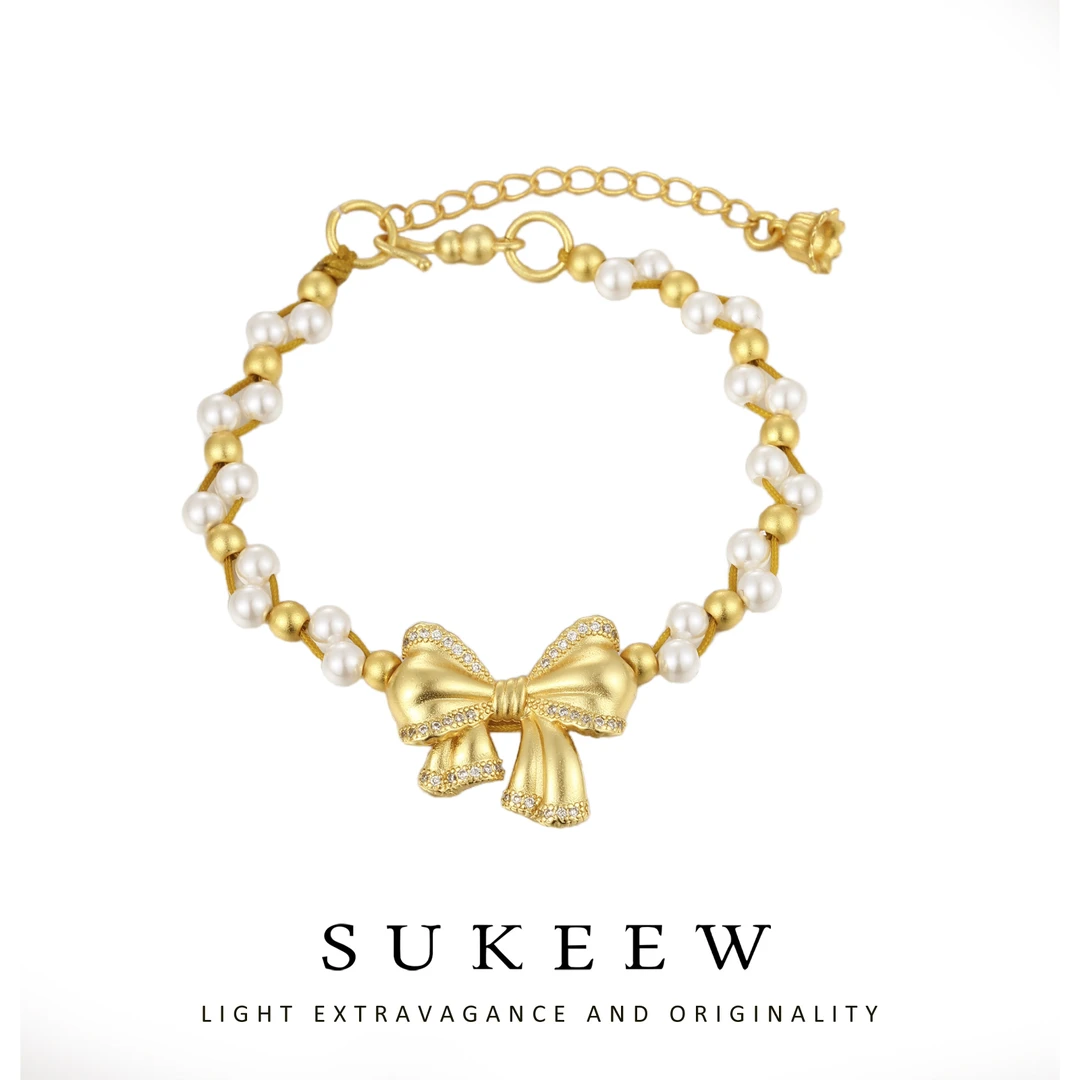 SUKEEW/酥可 铜合金手链 编制时尚蝴蝶结气质珠珠手链012918