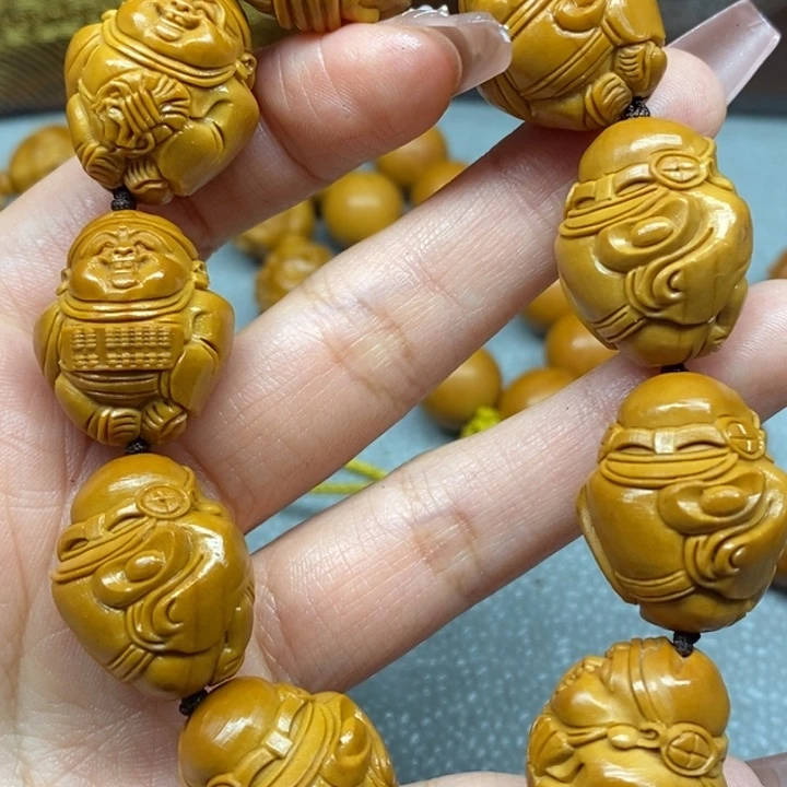 橄榄核核雕八大财神