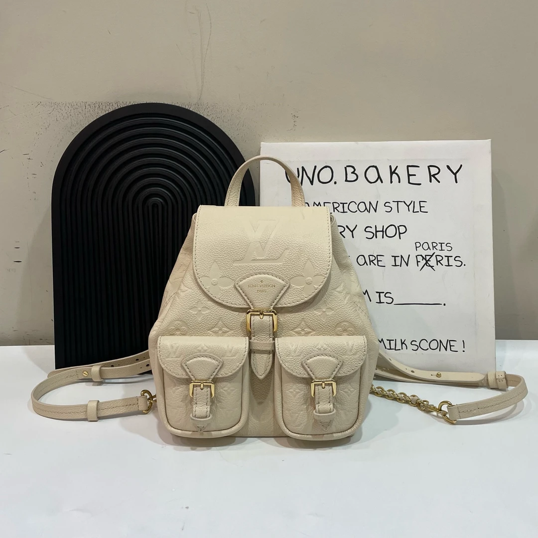 95新 LouisVuitton/路易威登 【蔡包紫】奶油白压纹双肩包