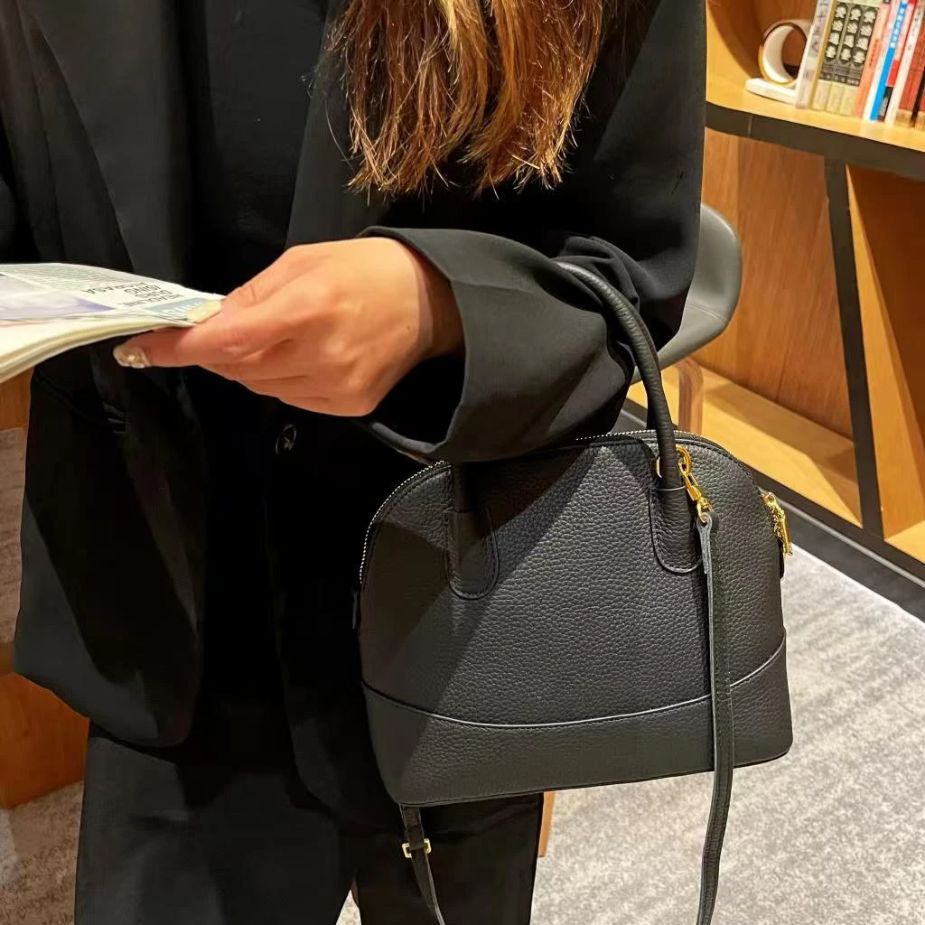 时尚头层牛皮贝壳包