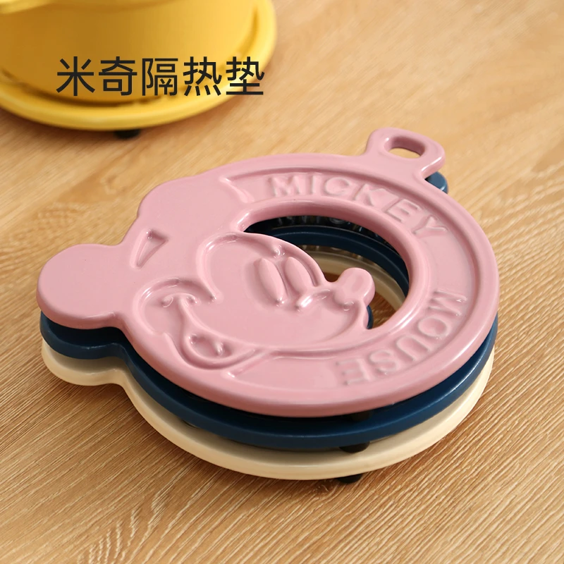 YANZAO/焱造铸铁珐琅锅米奇隔热垫