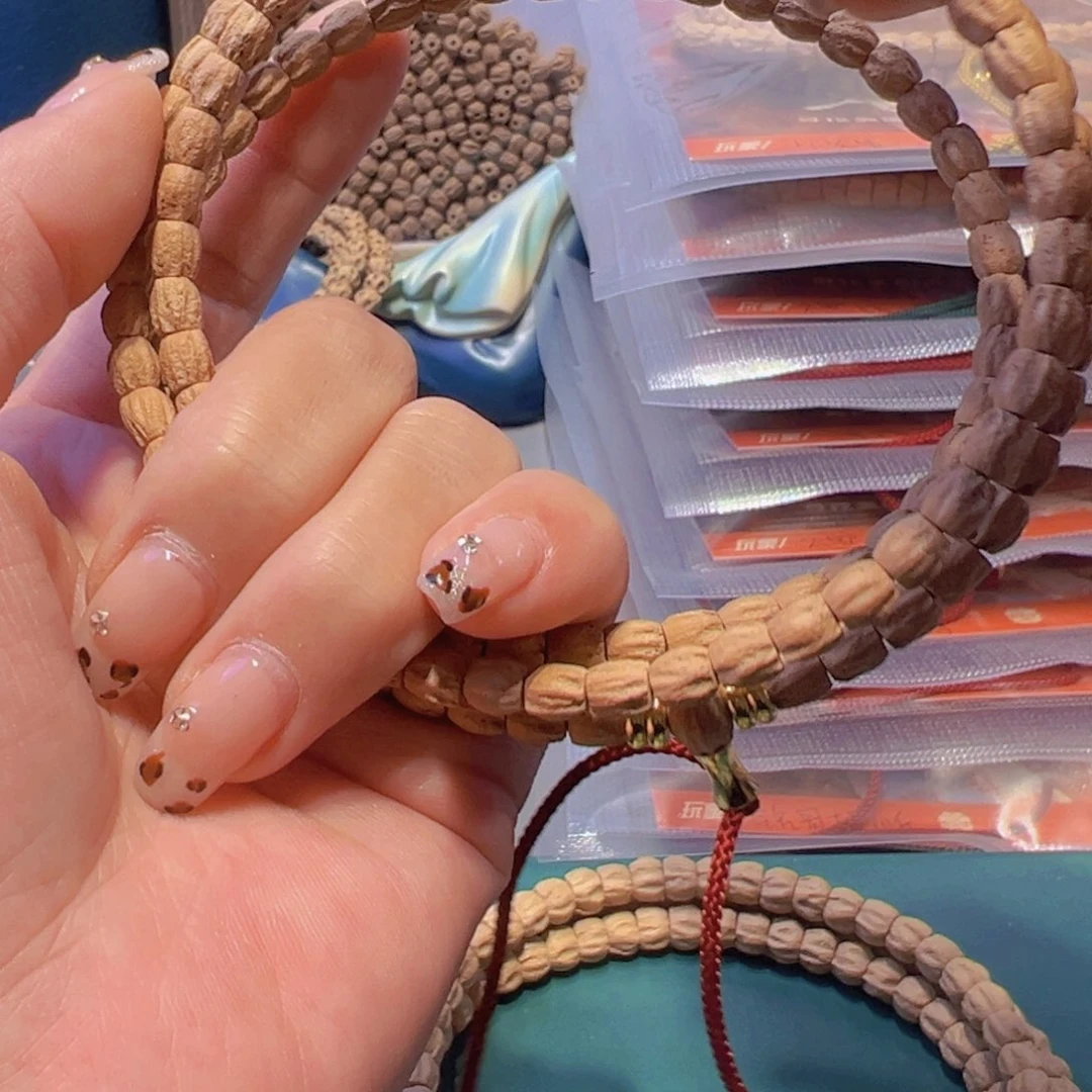 柏香籽/百香籽吊坠我***鱼