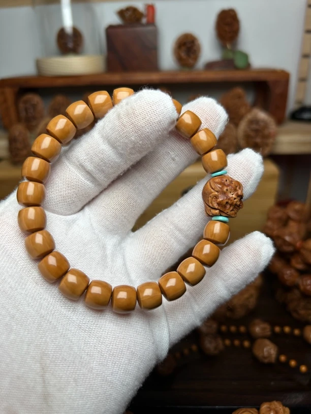 潍坊桃核纯手工雕刻~罗汉头核雕配猴头手串~尺寸1.58/0.95