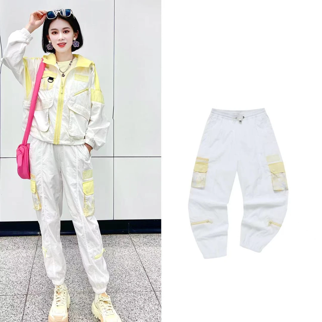 Fila/斐乐女子夏日简约清爽运动时尚款百搭梭织收口裤 T11W227806