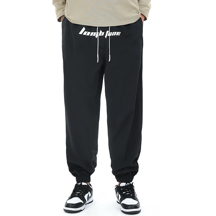 100锦纶重刺绣宽松弹力运动束脚休闲裤男女同款-3120