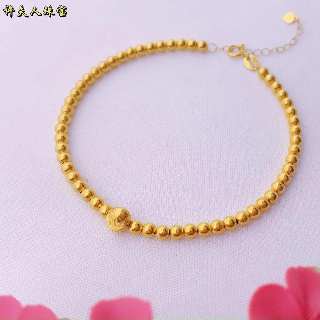 AU750蹦迪光面百搭金手链精美猫眼光珠手链18k金手链