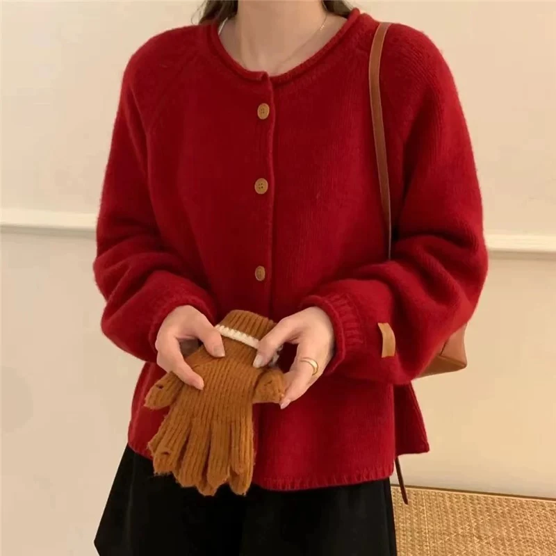 圆领纯色贴标灯笼袖针织衫毛衣