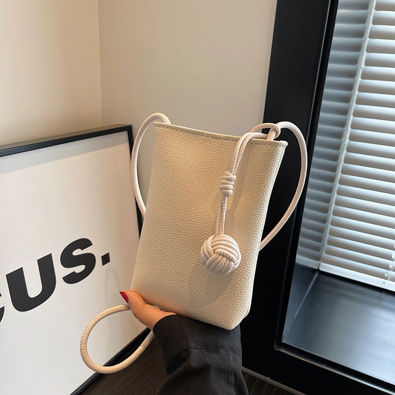 小众通勤挤地铁手机包防盗耐磨迷你便携竖款背包简约百搭包包女款