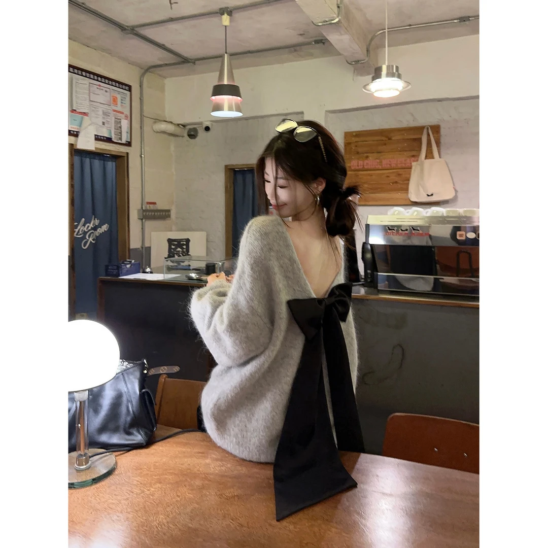 慵懒风性感露背蝴蝶结设计长袖宽松毛衣女秋季新款套头显瘦针织衫