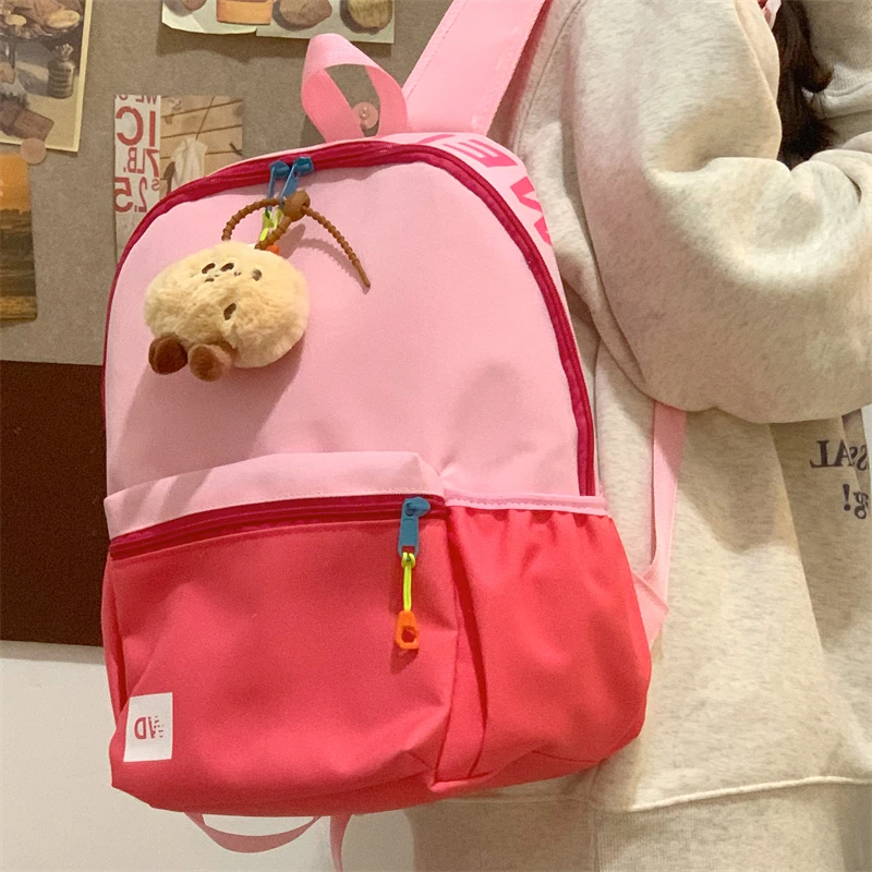 儿童书包小学生撞色轻便大容量背包三四五六年级减负初中生双肩包