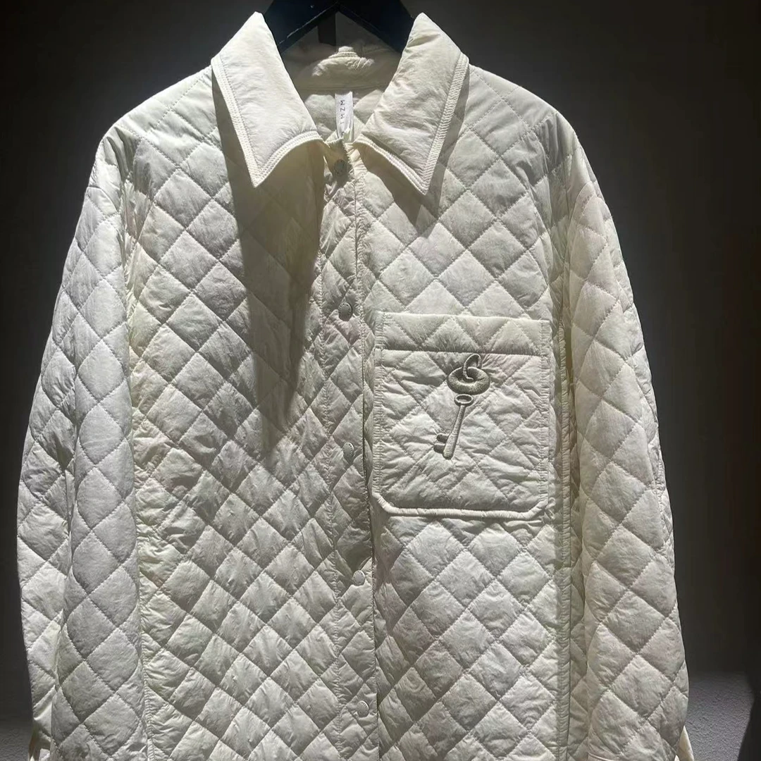 未知未觉菱格翻领棉服