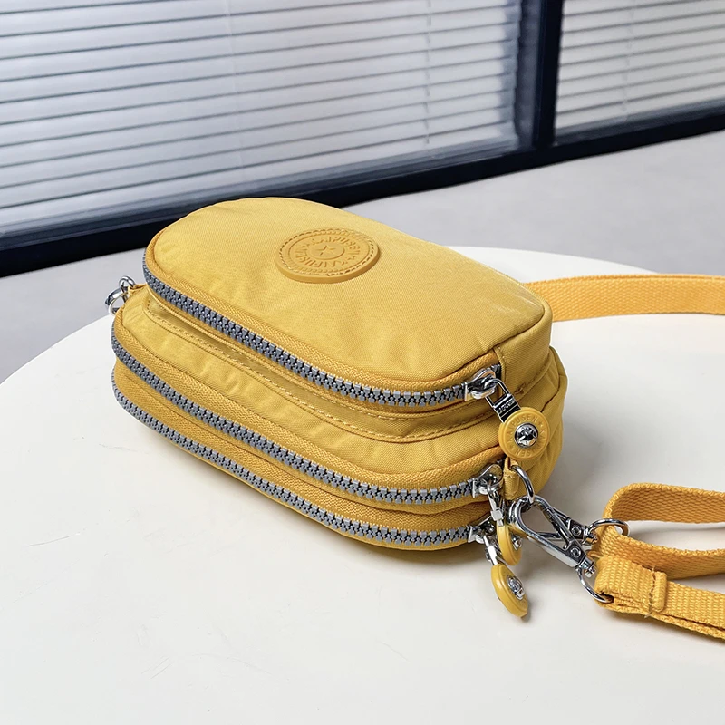 凯普森手机斜挎包2025新款小布包防水小巧手包三层时尚女包手拿包