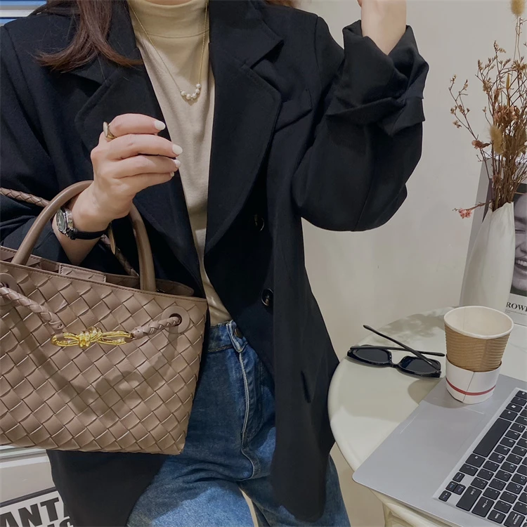 B八字扣V羊皮手工编织女士小众肩包真皮女包包包