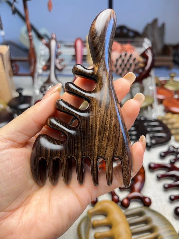 紫光檀大拇指按摩梳