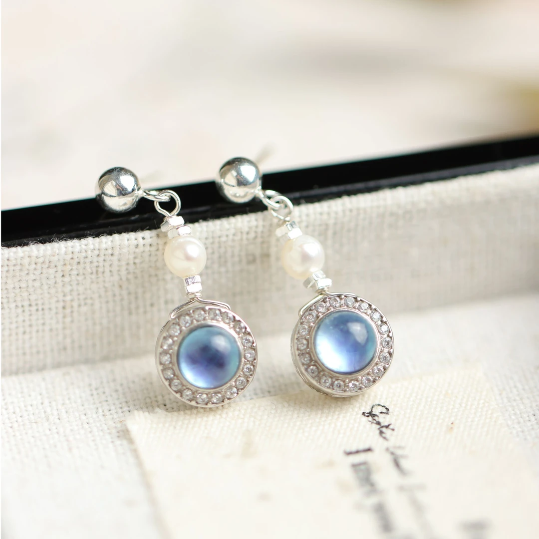 S925银素银镶嵌海蓝宝镂空圆面时尚精致款送礼女款耳钉