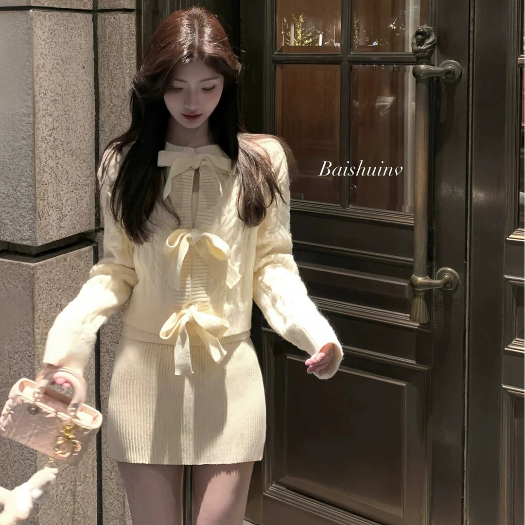 韩系甜美少女2024冬季新款时尚懒慵风蝴蝶结针织开衫搭配高腰短裙
