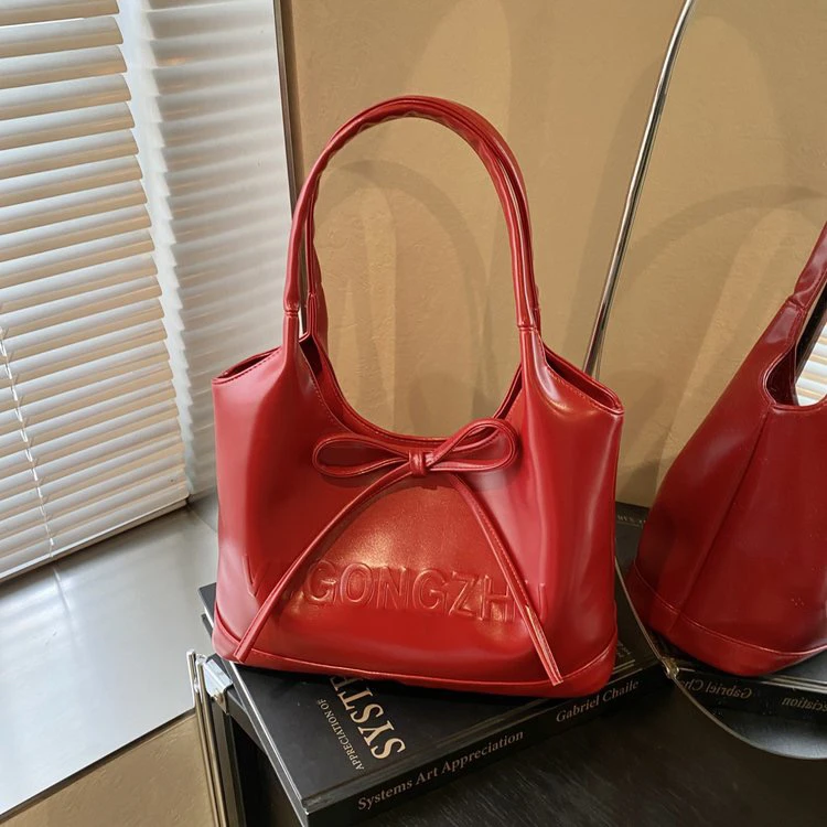 高级感休闲芭蕾风水桶包轻奢新款冬季百搭红色蝴蝶结单肩新娘包