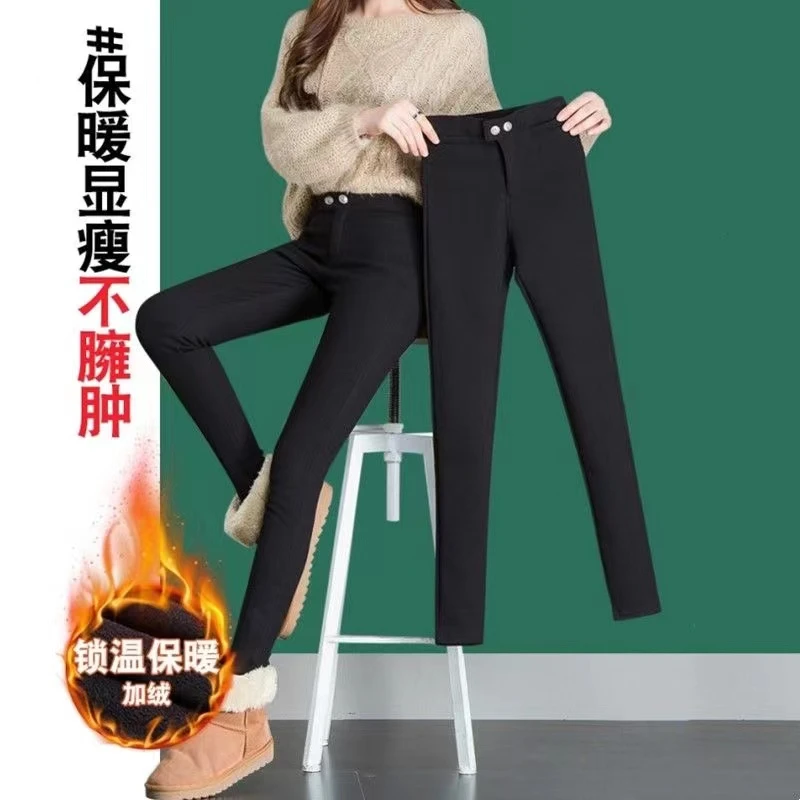 秋冬季百搭神裤小脚双扣加绒小黑裤外穿显瘦纯黑牛仔裤加厚修身裤