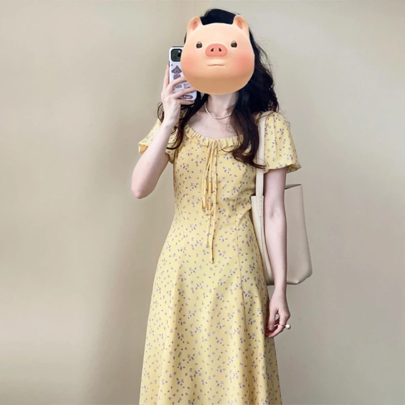 黄色碎花泡泡袖连衣裙子女夏季产地好物法式气质海边度假长裙3849
