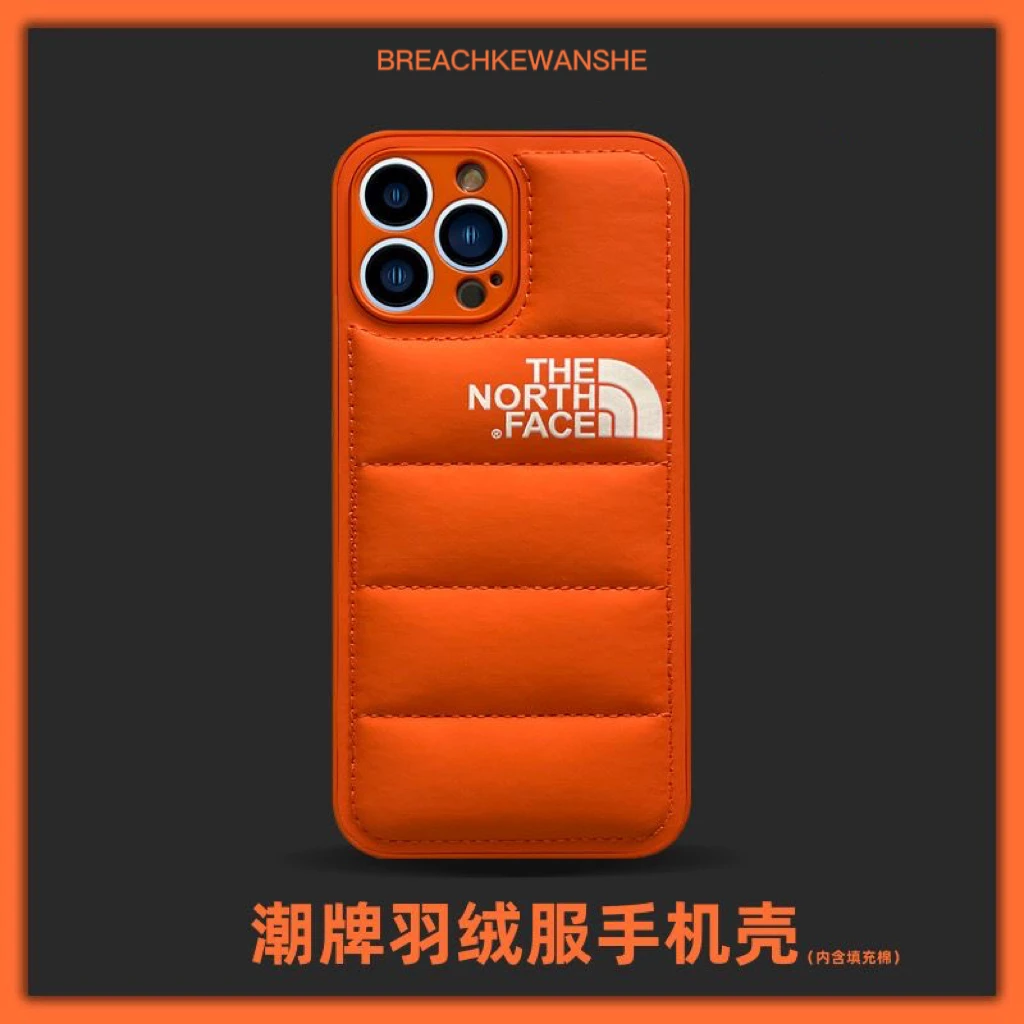 适用iPhone潮牌羽绒服防摔情侣款手机壳适用苹果11/12/13/14全包