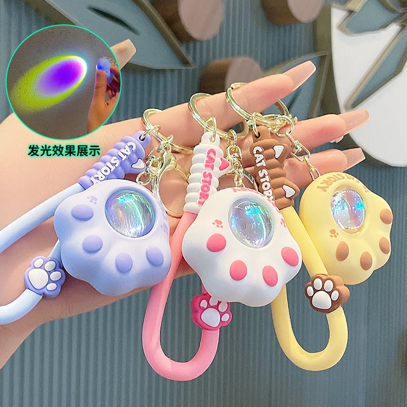 可爱猫爪夕阳灯书包挂件汽车钥匙扣小饰品创意猫咪落日灯女钥匙链