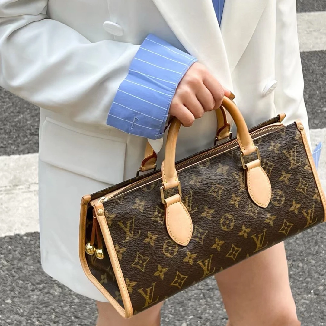 95新 LouisVuitton/路易威登 手提三角金球包 972156