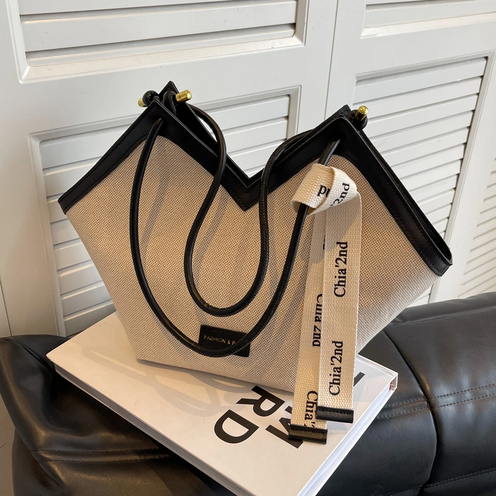 帆布包包女大容量2025新款小众韩版单肩包百搭质感上课通勤托特包