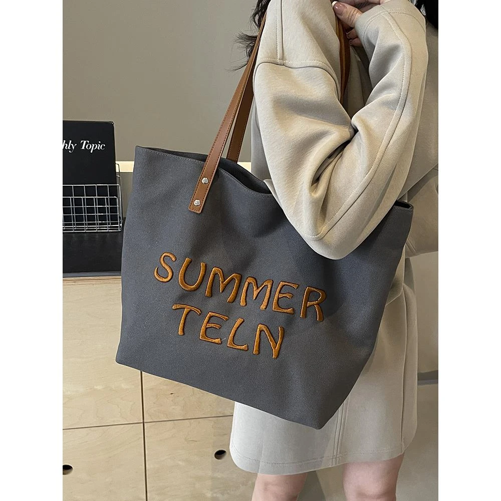 帆布上课通勤包包女大容量2024新款秋冬休闲百搭单肩大学生托特包