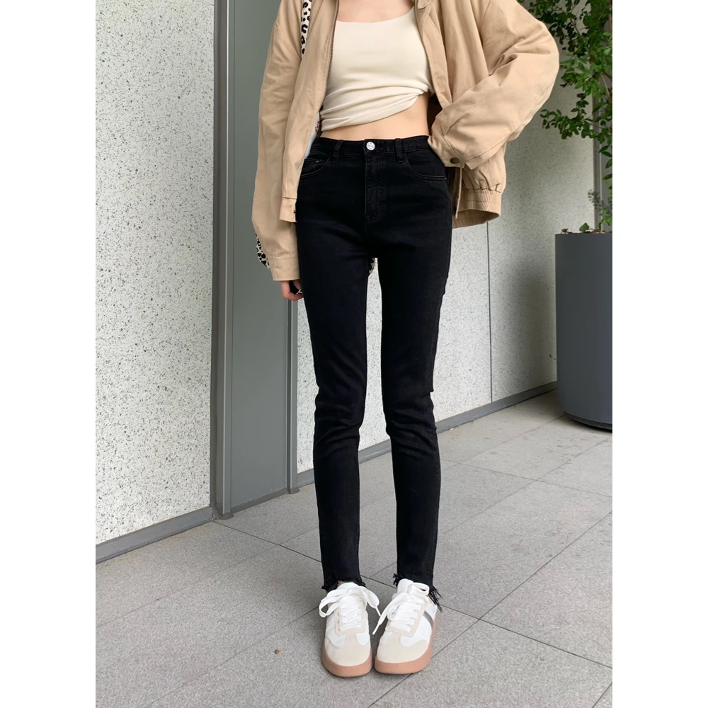 深圳南油/断码/新款简约黑色休闲时尚百搭显瘦修身小脚牛仔裤8605