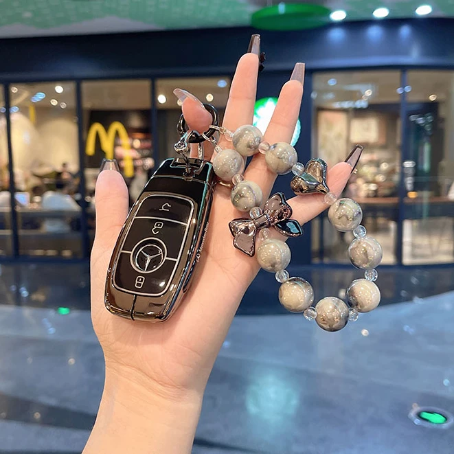 适用奔驰钥匙套新e级c级e300包c260l壳a200l汽车glb/gle/glc350扣
