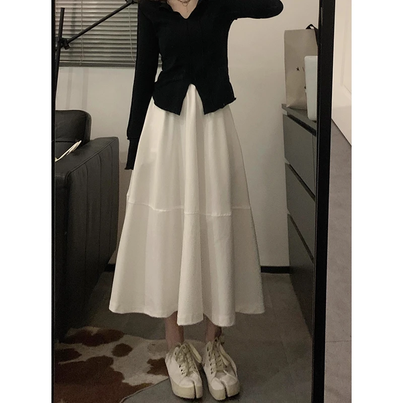 设计感白色半身裙女春秋新款百搭高腰显瘦a字裙中长款休闲伞裙子